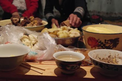Tibetan cuisine.  Tsampa, Yak meat and butter tea.